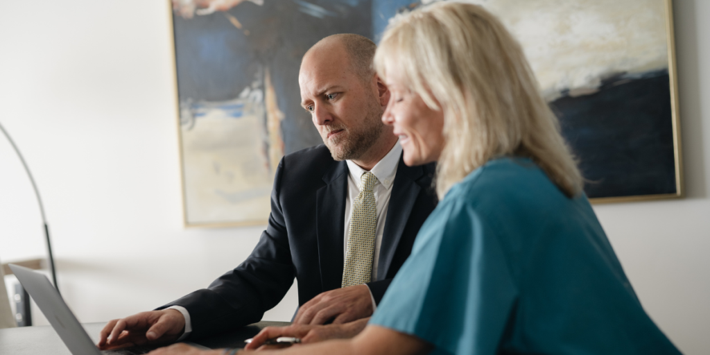 Attorney Matt Odgers consulting with a client
